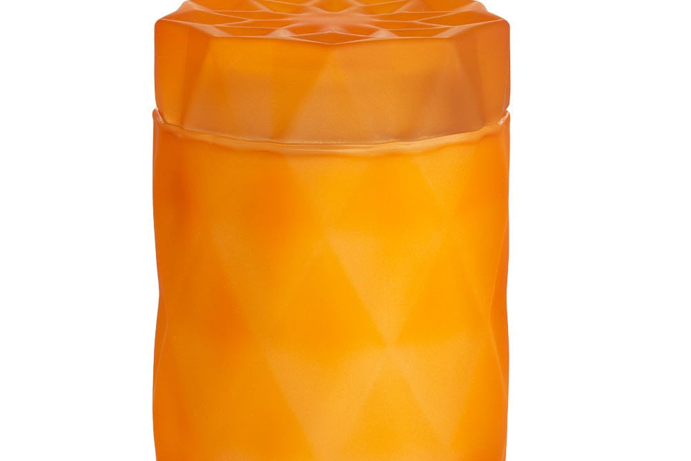 coconut wax candle in matte orange glass jar with lid